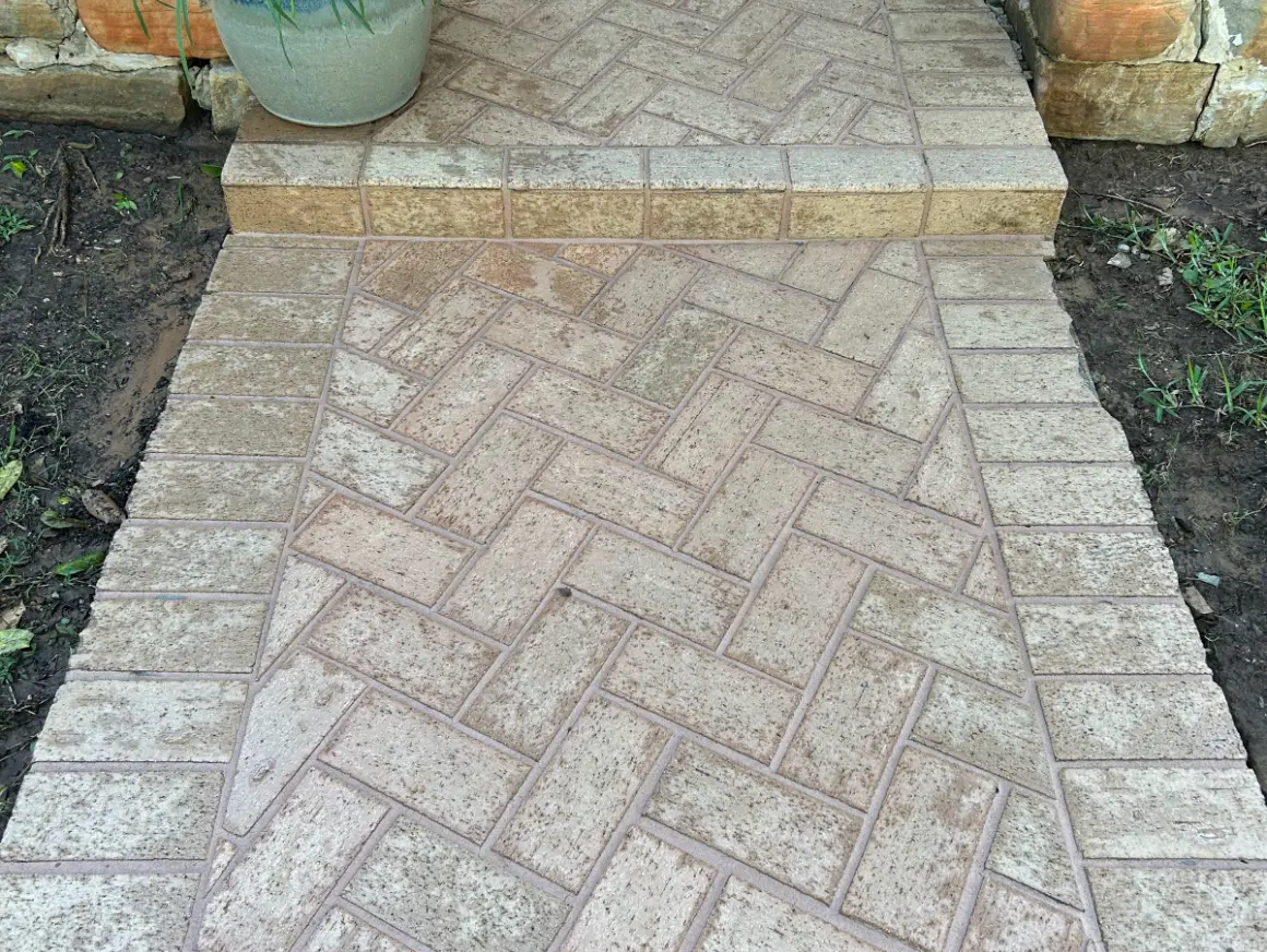 Dirty driveway before cleaning